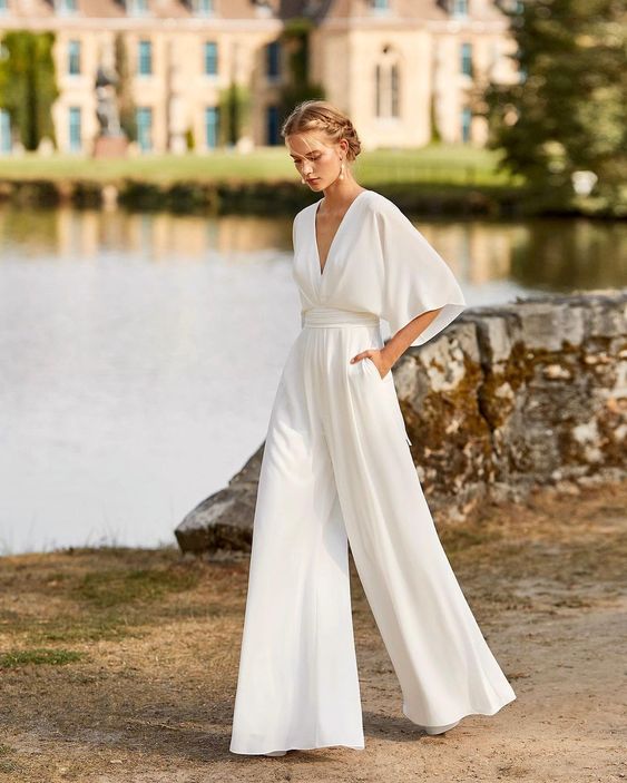 Suzette Dame Jumpsuit – Elegant Jumpsuit med Dyb Udstigning og Vide Ben for en Sofistikeret Stil
