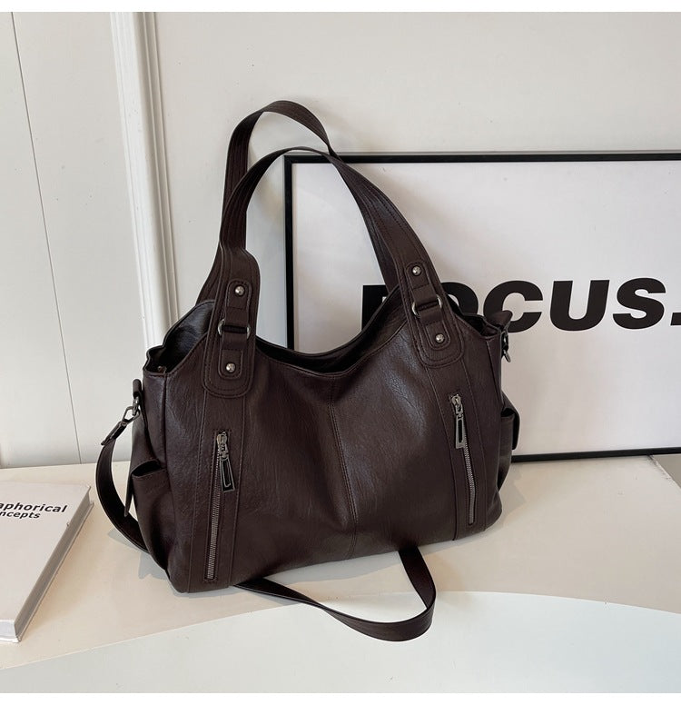 Dakota Dame Crossbody Taske – Elegant Lædertaske med Justerbar Rem & Rummeligt Design