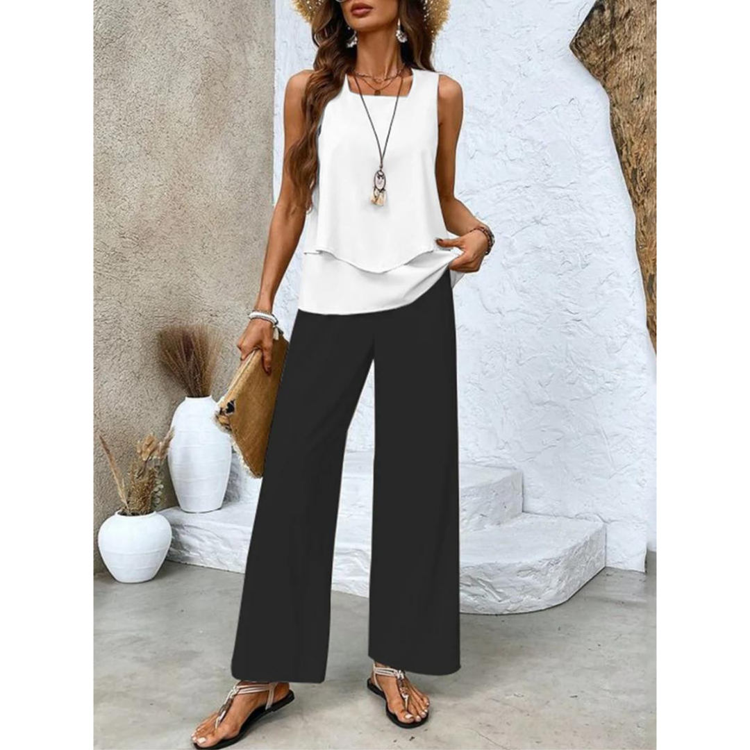 Dione Damesæt – Elegant Ærmeløst Sæt med Lagdelt Top og Brede Bukser.