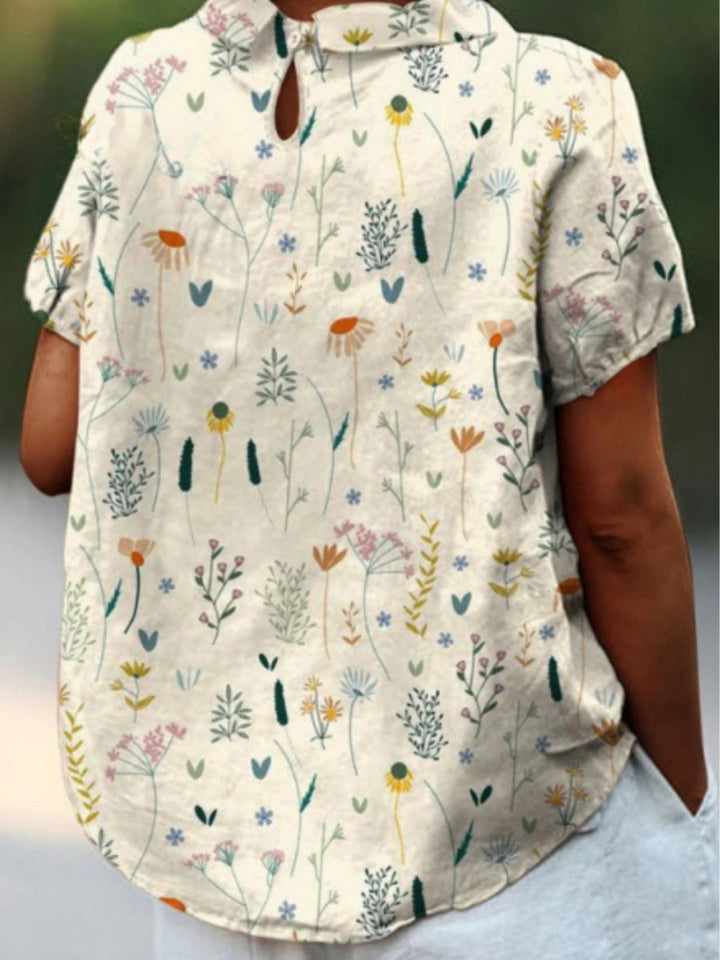 Alina Damebluse – Let Bluse med Vildt Blomsterprint & Afslappet Sommerpasform