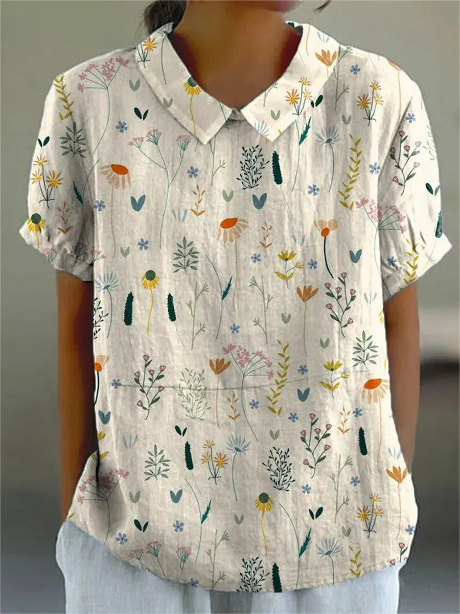 Alina Damebluse – Let Bluse med Vildt Blomsterprint & Afslappet Sommerpasform