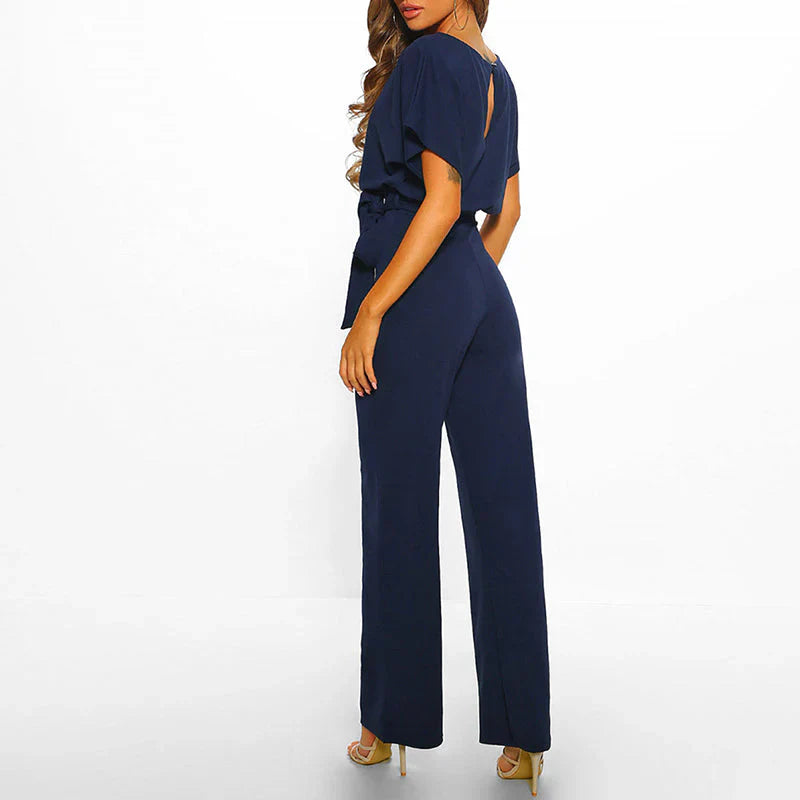 Tabitha Dame Jumpsuit – Elegant Jumpsuit med Bindebånd og Flatterende Snit