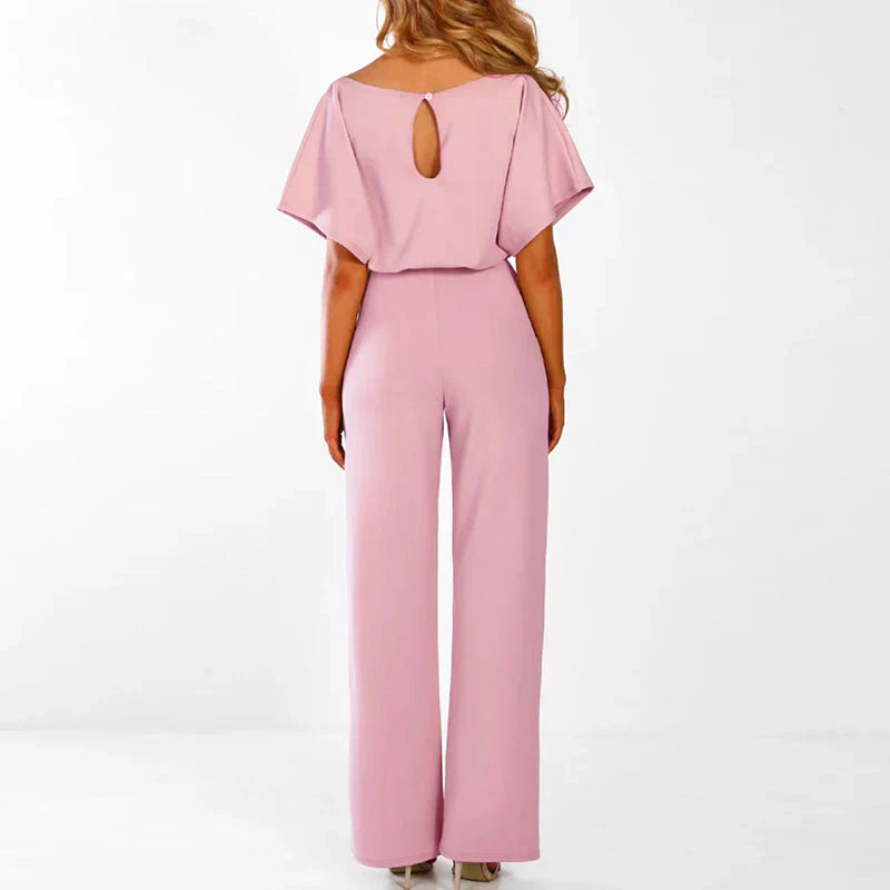 Tabitha Dame Jumpsuit – Elegant Jumpsuit med Bindebånd og Flatterende Snit