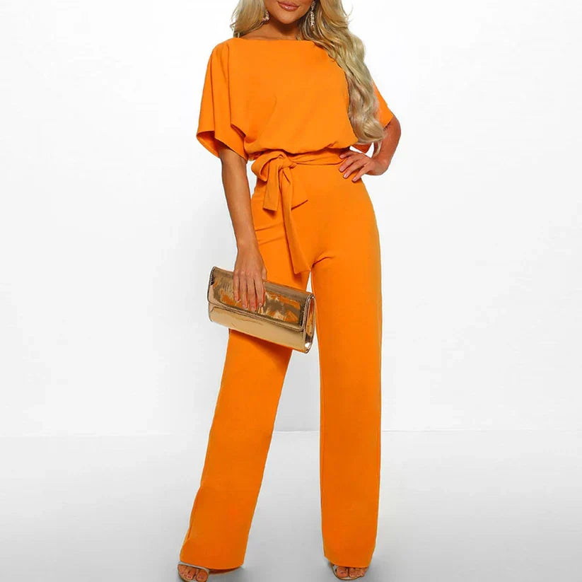 Tabitha Dame Jumpsuit – Elegant Jumpsuit med Bindebånd og Flatterende Snit