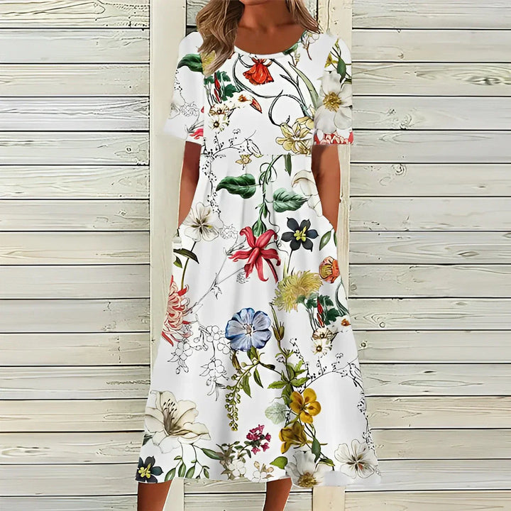 Liva Dame Midi Kjole – Hvid Blomsterkjole i Åndbart Materiale med Løs og Komfortabel Pasform